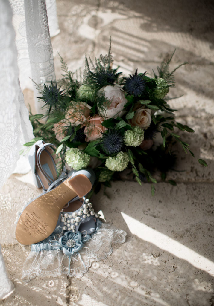 A great idea for your "something old something new" is a blue shoe.