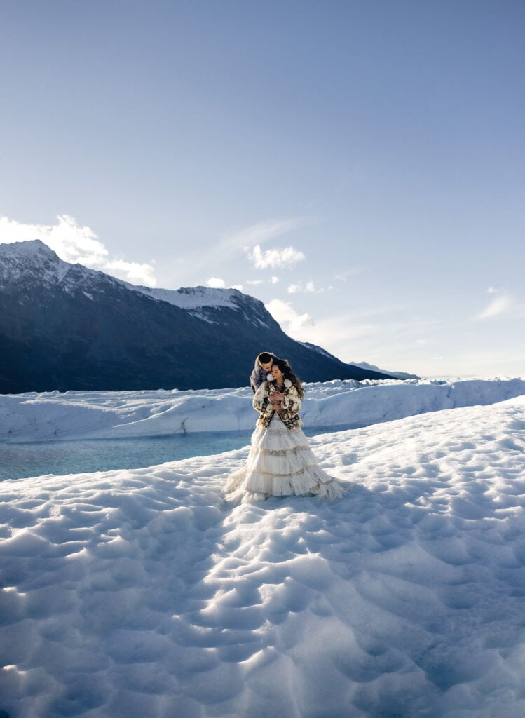 A couple enjoying their knik glacier elopement in Alaska.