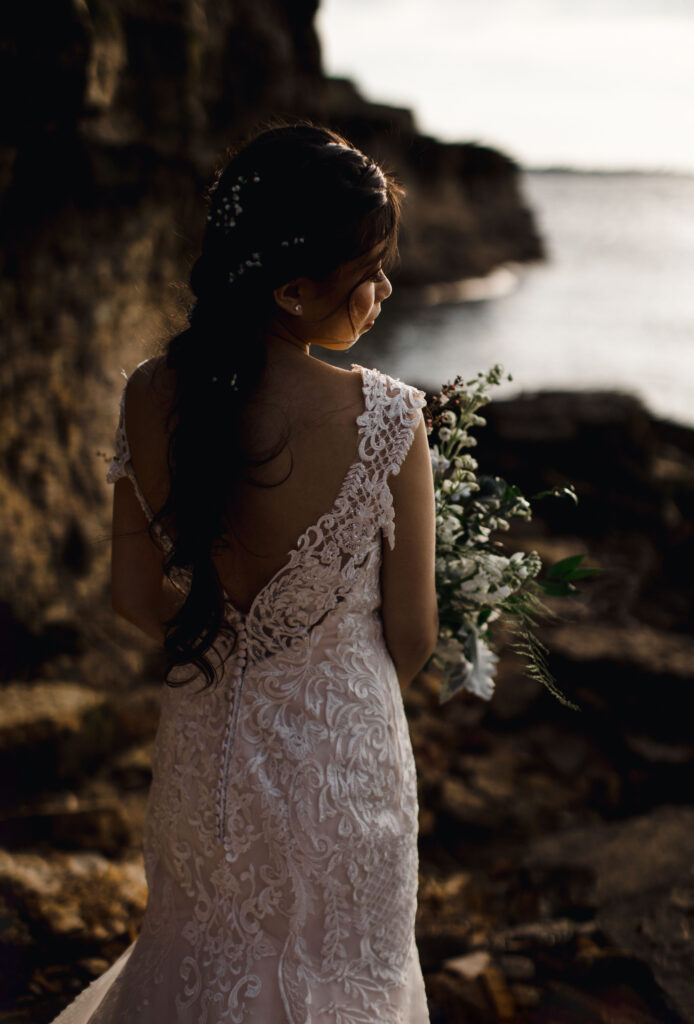 A bride at her second wedding in a white dress.